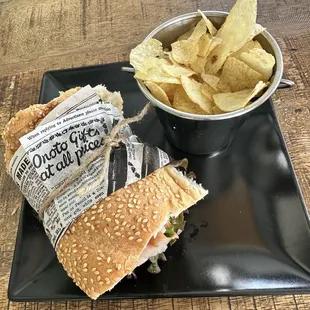 a sandwich and chips