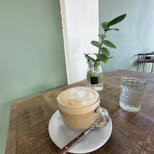 a cup of coffee on a saucer