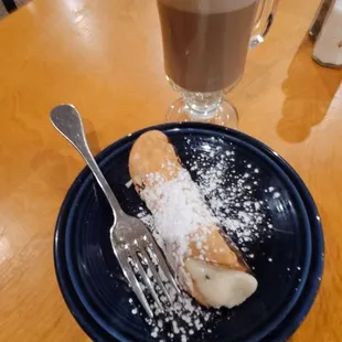 Cannoli and cappuccino