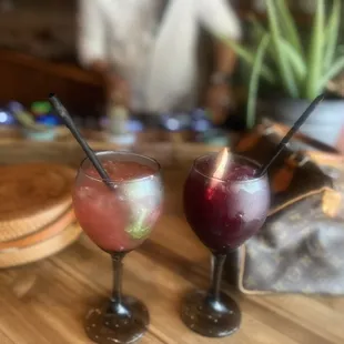 two cocktails on a table