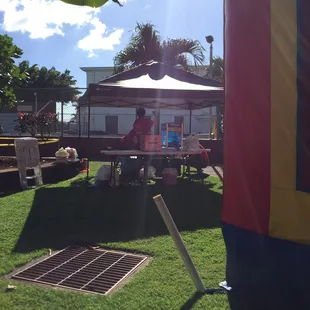 Tent setup for halo-halo, cotton candy, and shave ice