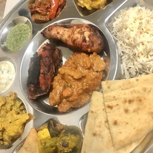 Lamb/Chix/Veggie curry, Butter chix(makhani), Pakora, Tandoori chix, Basmati rice,Raita,Chutney. Naan n Samosa r just store-bought