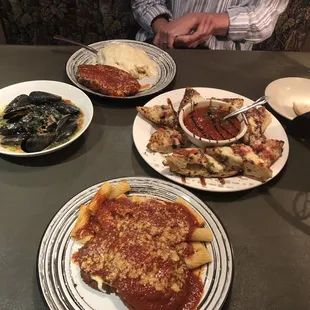 Mussels, eggplant Parm, bruschetta bread, chicken parm.