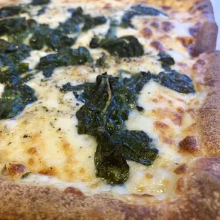 Personal (9&quot;) white pizza with spinach and extra cheese. Delicious. Highly recommend.