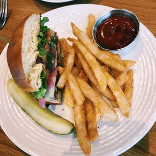 A pretzel bun burger and extra crispy fries