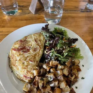 BYO Omelette with salad and potatoes