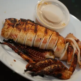 a plate of grilled squids