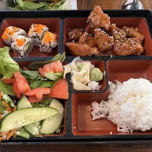 a bento box of food