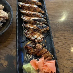 a long plate of food on a table