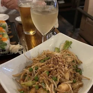 Shrimp Pad Thai and a glass of Sauvignon Blanc