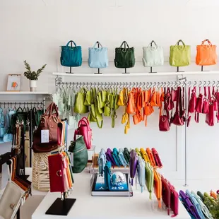 Our storefront has a magical, colorful selection of buttery soft leather handbags.
