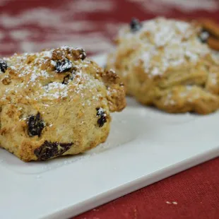 three scones on a white plate