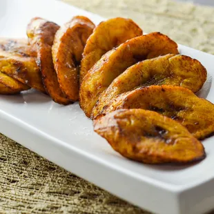 a plate of fried bananas