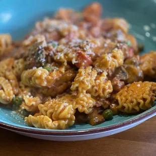 a plate of pasta and meat