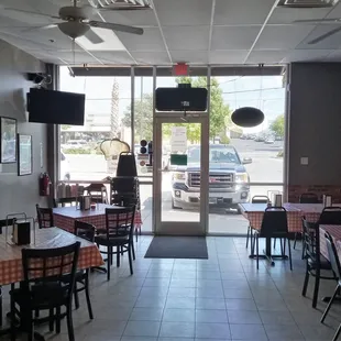 The interior, real old school pizza place.