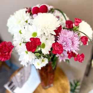 a vase of flowers on a table