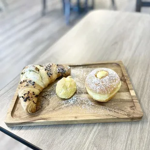 pastries on a wooden tray