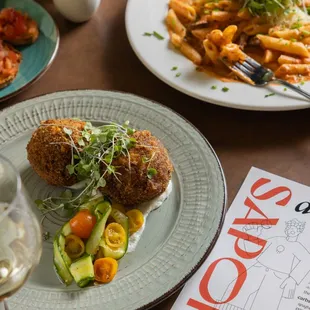 Can't beat an arancini appetizer paired with one of our pasta dishes.