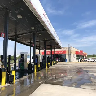 They were pressure washing the pavement at the pumps