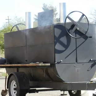 Our mobile grill.  For great mesquite-grilled chicken, tri-tip, ribs, hamburgers, or whatever you want!