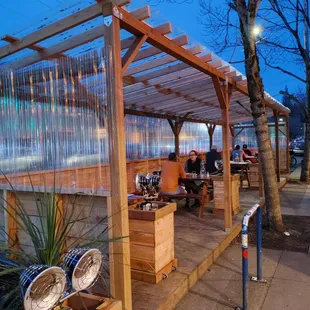 people sitting outside a restaurant