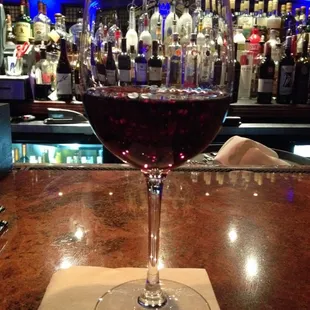 Enjoying my Pinot Noir at the Sapphire Room.