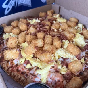 Breakfast meat eater pizza