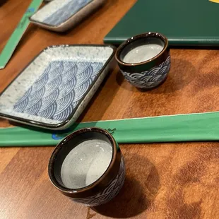 two cups of tea on a table