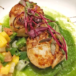 Pan seared scallops come out on the express conveyor belt