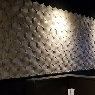Wall install, solid wood pieces brought together for a very cool visual effect.
