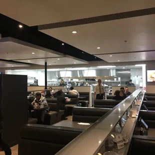 Inside of Sapporo, conveyor belt full of sushi