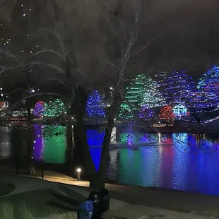 Millions of Christmas lights were reflected in the lake