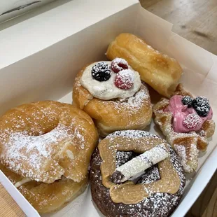Strawberry shortcake, creme chantilly, peanut butter brownie, berry croffle, and glazed