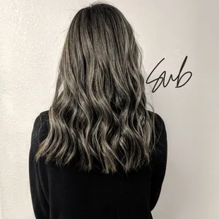Took this beauty from red with a warm Balayage to a blended cool tone all over!