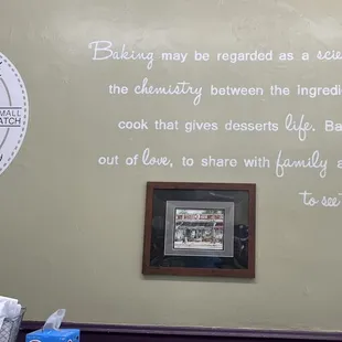 a wall with a quote on it