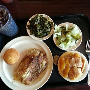 Tilapia with cabbage and collard greens with peach cobbler for dessert