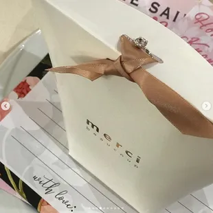 Staff placed 100 favor bags and game papers on each plate with no extra charge