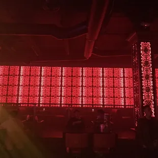 a large screen with red lights