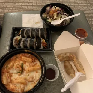 Bibimbap, kimbap, cheesy teokkbokki, and beef mandu.
