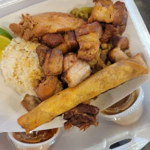 Lechon Kawali, Chicken Adobo, Pancit, Garlic Rice, and Lumpia