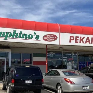 cars parked in front of the store