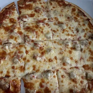 Thin crust, sausage pizza