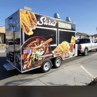 a food truck parked in a parking lot