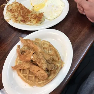 Chicken and Waffles w/ side of hash browns and eggs over hard