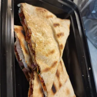 a sandwich in a plastic container