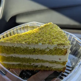 Pistachio cake, great ingredients, mildly sweet but the whipped cream was ever so slightly frozen which made it mediocre