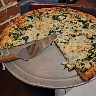 Spinich and cheese pizza