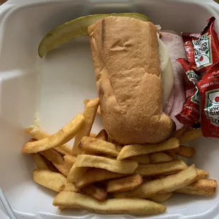 Italian cold cut deli sandwich, with pickle