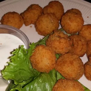 Fried mushrooms with a side of ranch dressing.