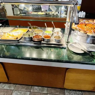 a buffet with many different foods
